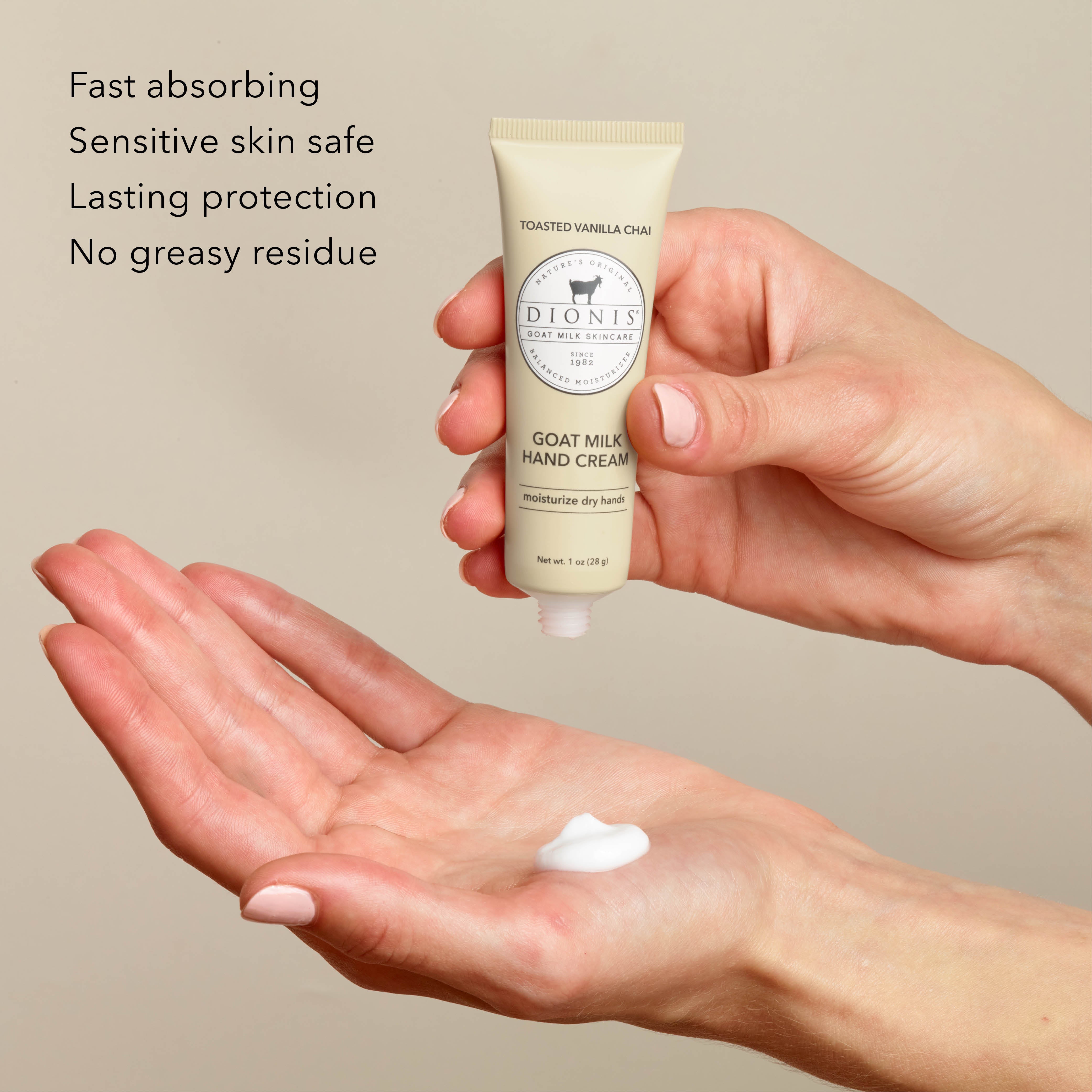 A person holds a tube of Dionis Goat Milk Hand Cream above an open palm with a dollop of white cream, with text on the left describing absorbing and sensitive skin benefits.