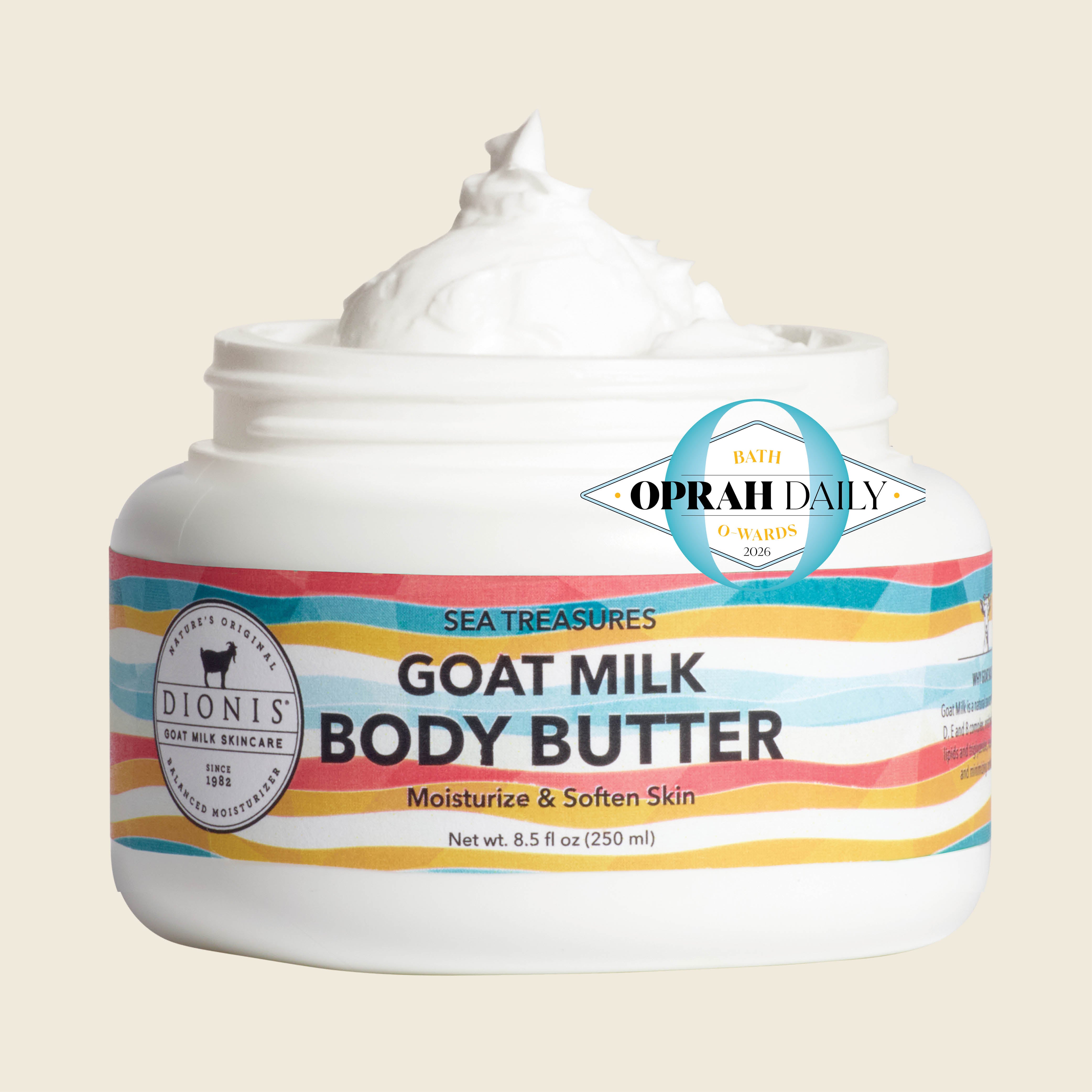 A white jar of Dionis Sea Treasures Goat Milk Body Butter with a swirl of white cream visible at the top, set against a solid light beige background. The label features colorful stripes and text, including a 'With Oprah Daily' badge.