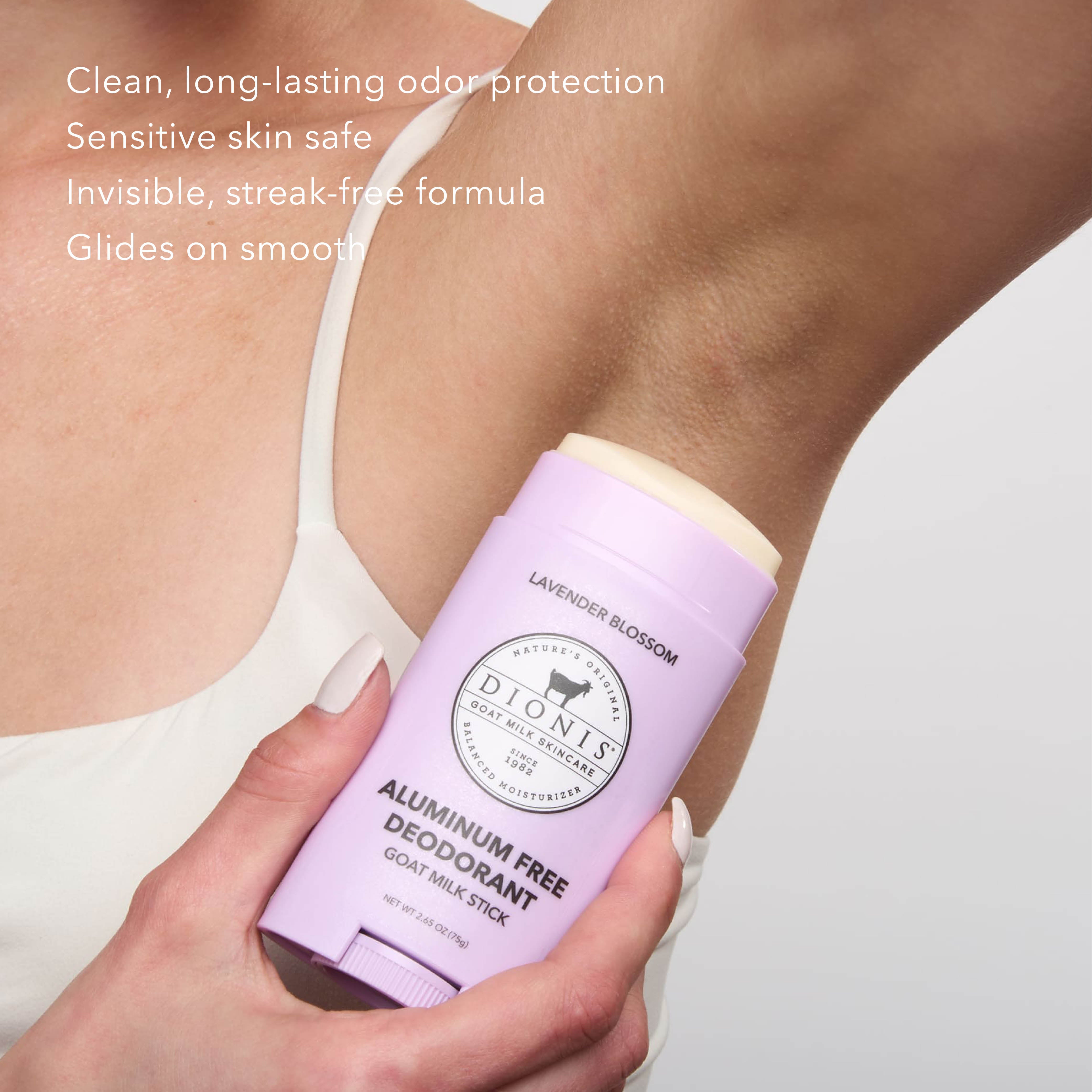 A woman applying Dionis Goat Milk Deodorant to her underarm. Text on the image reads "Clean, long-lasting odor protection. Sensitive Skin Safe. Invisible, streak-free formula. Glides on smooth."