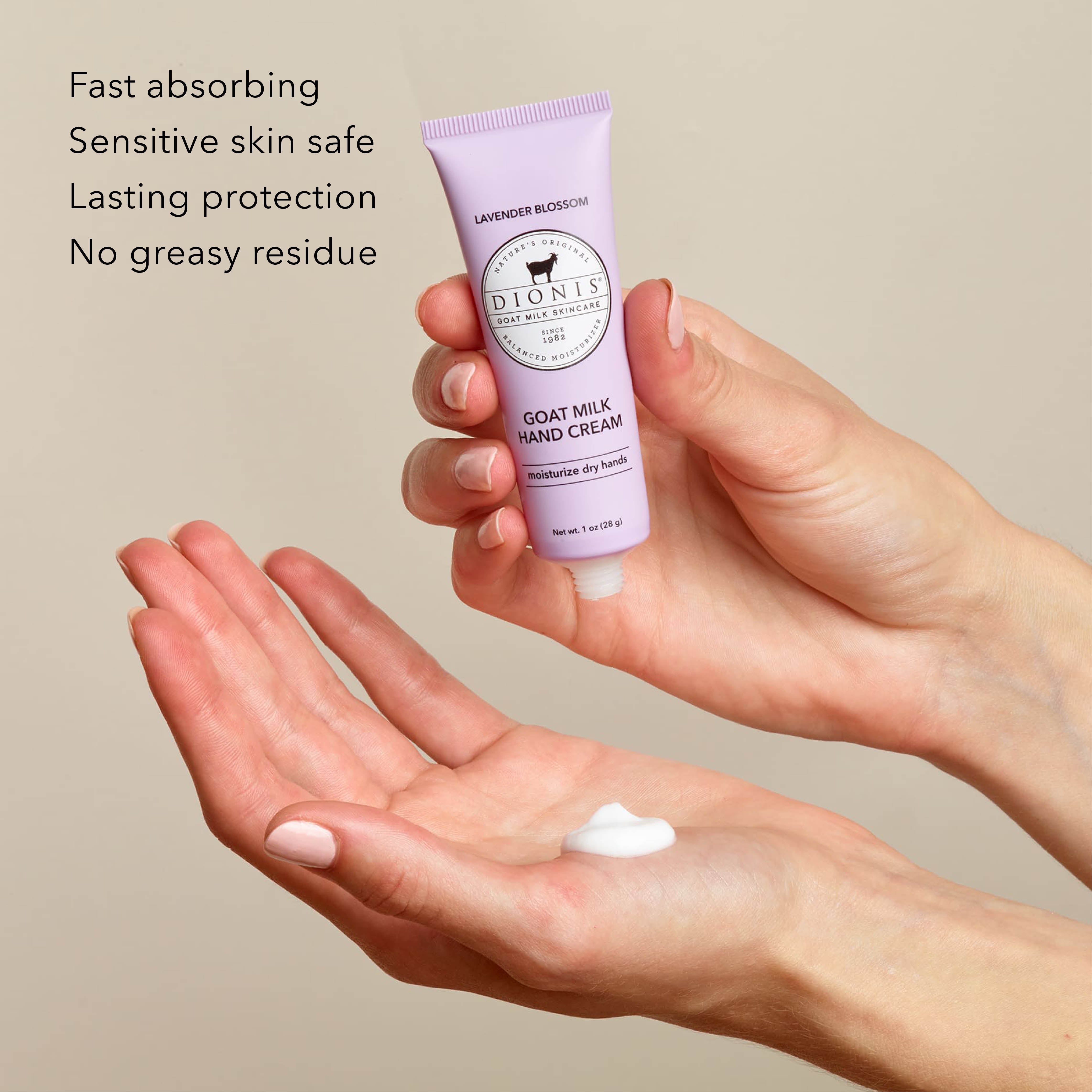 A hand holds a tube of Dionis Goat Milk Hand Cream in Lavender Blossom above another hand showing a dollop of white cream, with marketing text on the left against a beige background.