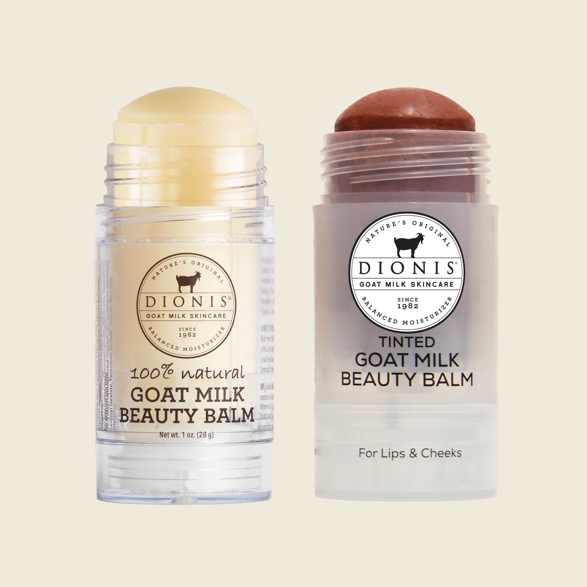 Two round cosmetic balm sticks from Dionis Goat Milk Skincare on a light beige background. The left stick is open, showing a pale yellow balm stick in a clear container.