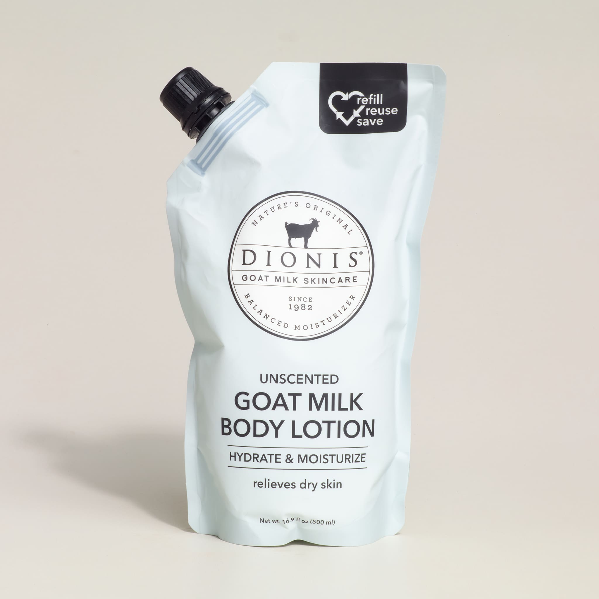 Dionis unscented goat milk body lotion packaging on a beige background