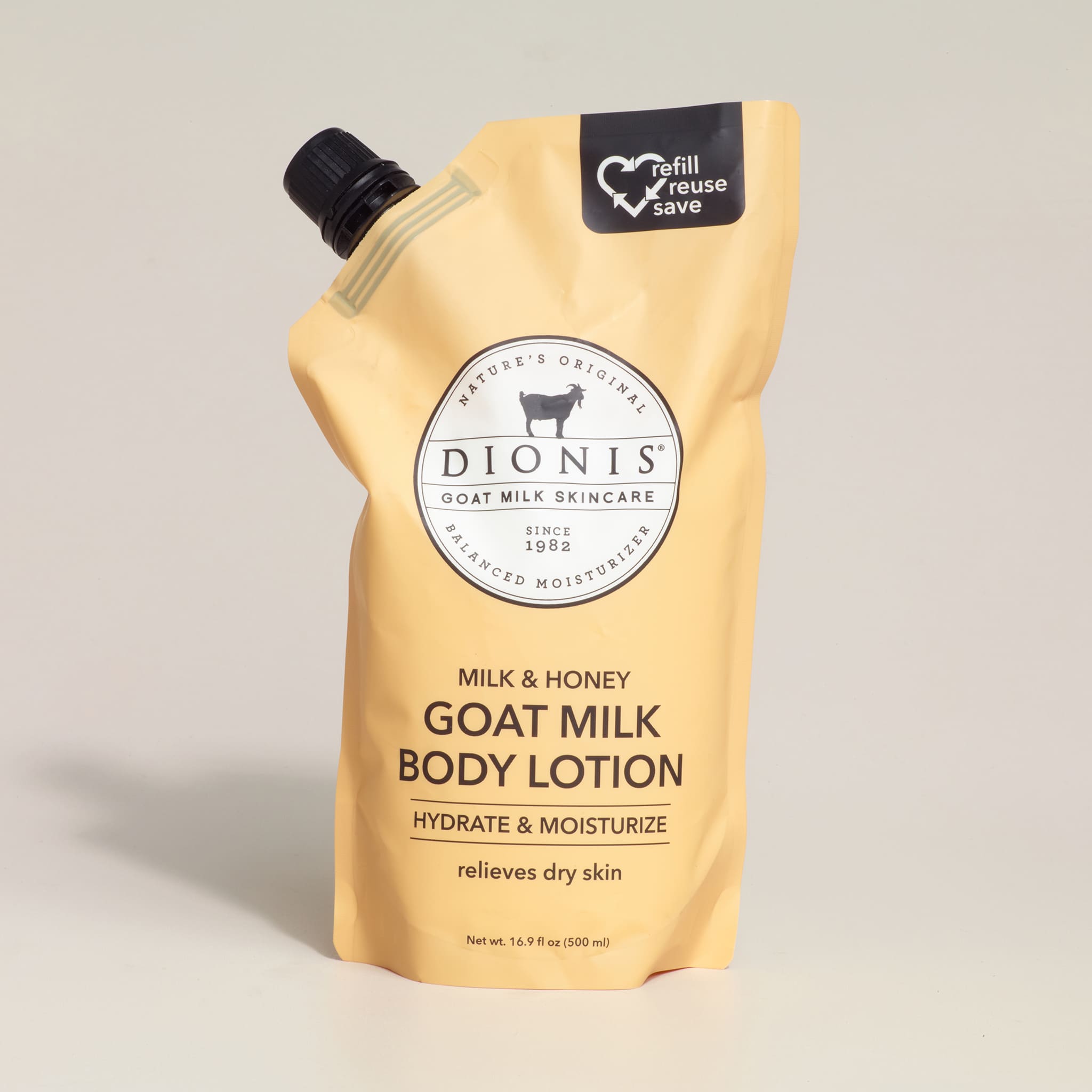 Dionis goat milk body lotion packaging on a light gray background