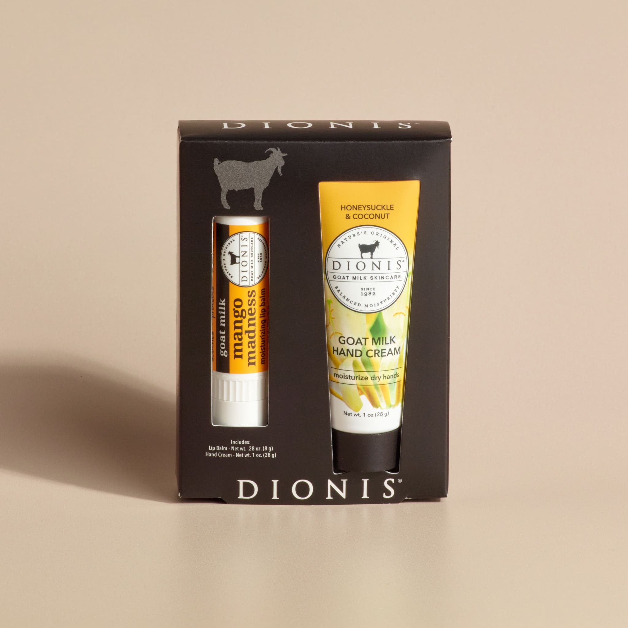 Dionis Goat Milk Skincare Honeysuckle Mango Lip & Hand Set in its packaging against a plain beige background