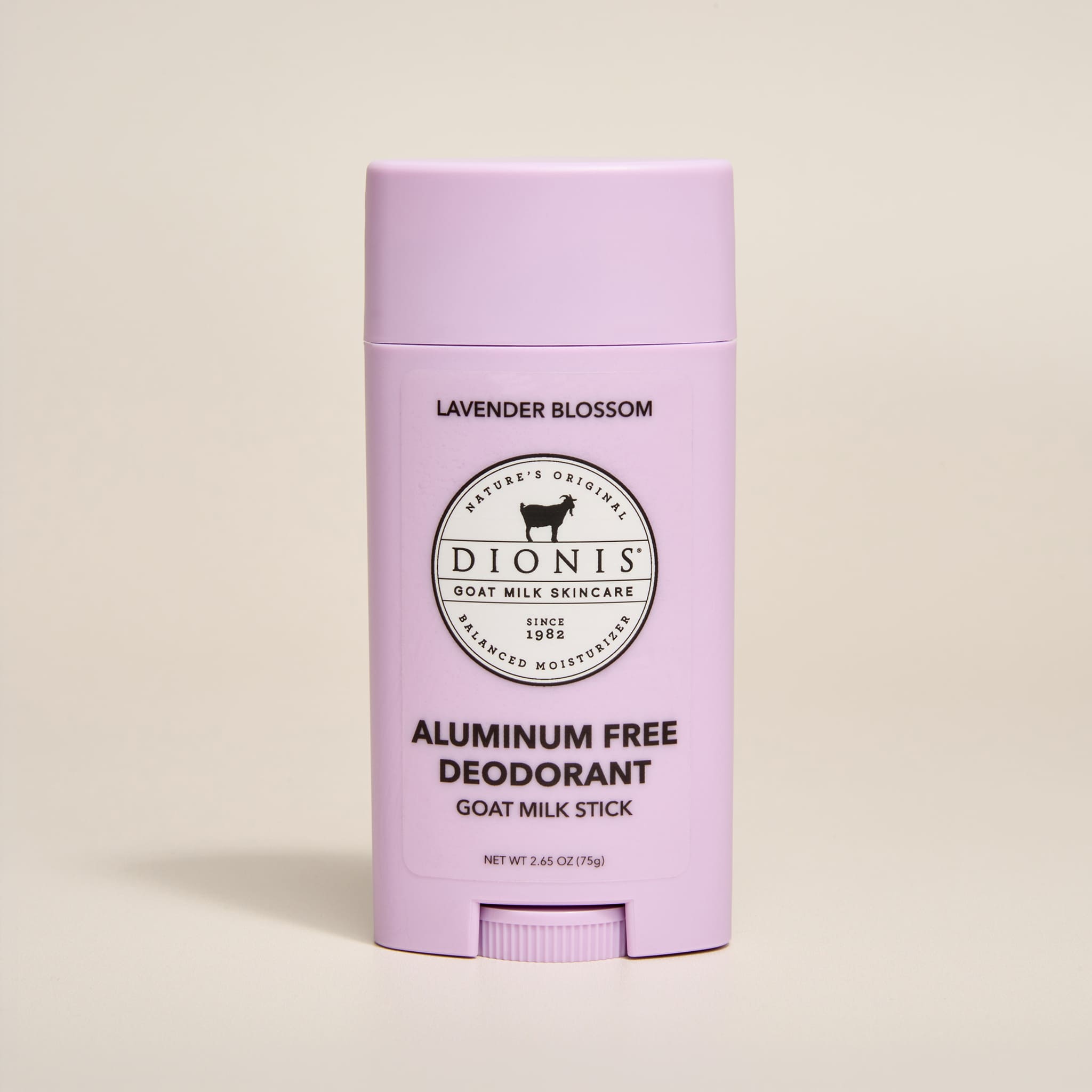 Lavender Blossom goat milk aluminum-free deodorant stick with Dionis branding on a beige background
