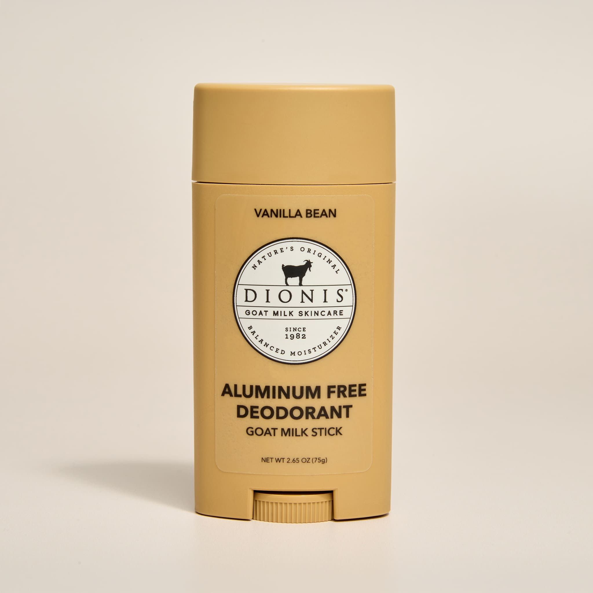 Dionis vanilla bean aluminum-free goat milk deodorant stick on a beige background