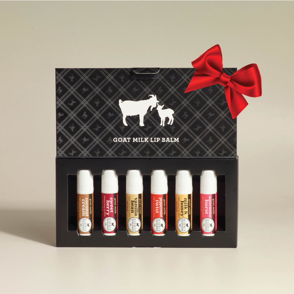 Dionis Lip Balm Deluxe Box Set includes 6 top selling lip balm flavors in a sophisticated gift set. Shown with a red bow.