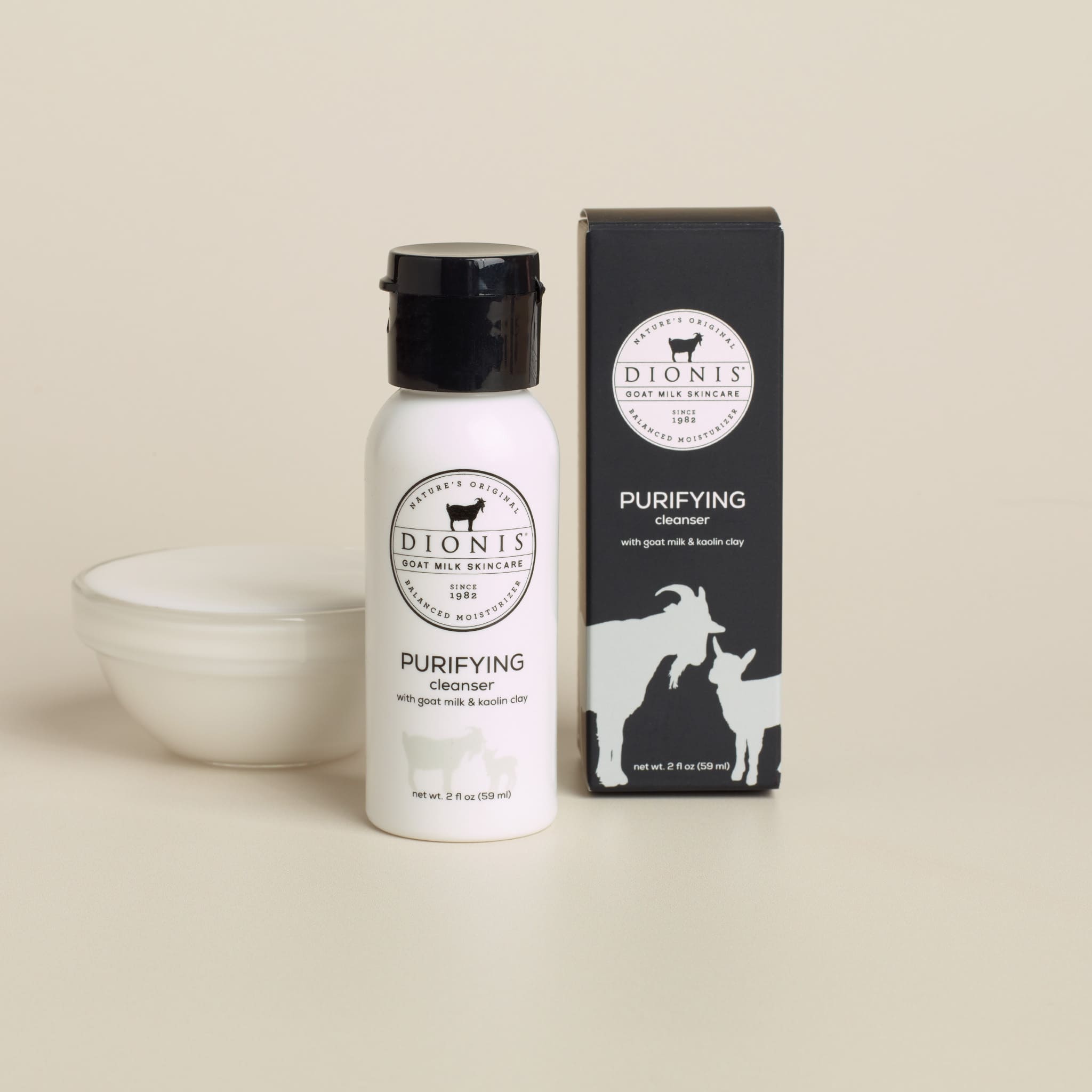 A 2 fl oz white bottle of Dionis Purifying Cleanser with a black flip-top cap, shown on a plain white background.