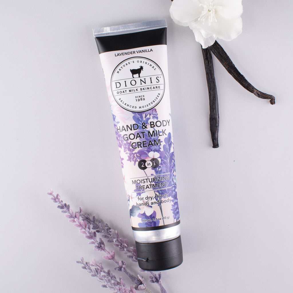 Tube of Lavender Vanilla goat milk hand & body cream, with vanilla bean and lavender accessories