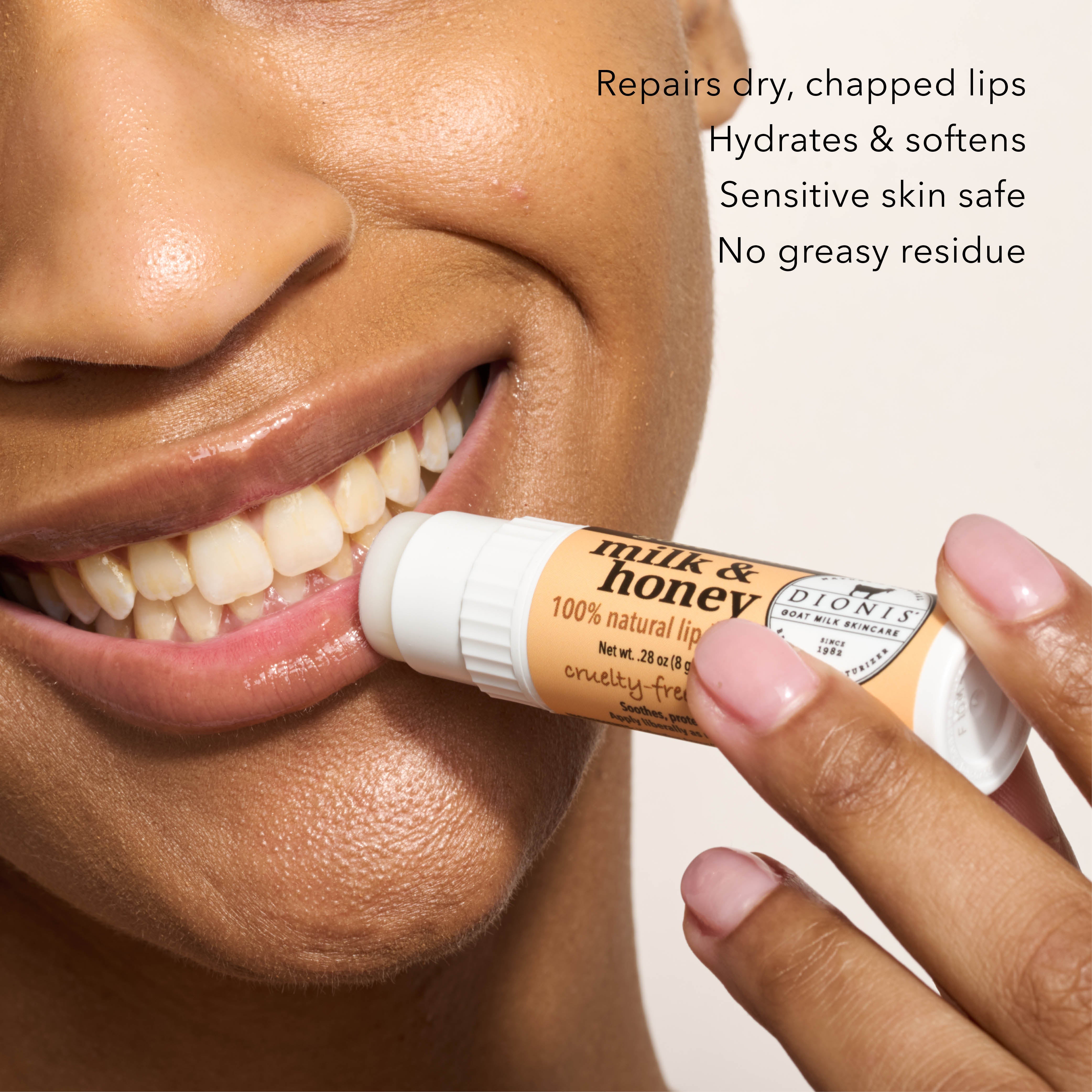 A close up of model applying Dionis Goat Milk Lip Balm, Milk & Honey, to lips. 

Benefits: 
- Repairs dry, chapped lips. 
- Hydrates & softens.
- Sensitive skin safe.
- No greasy residue. 