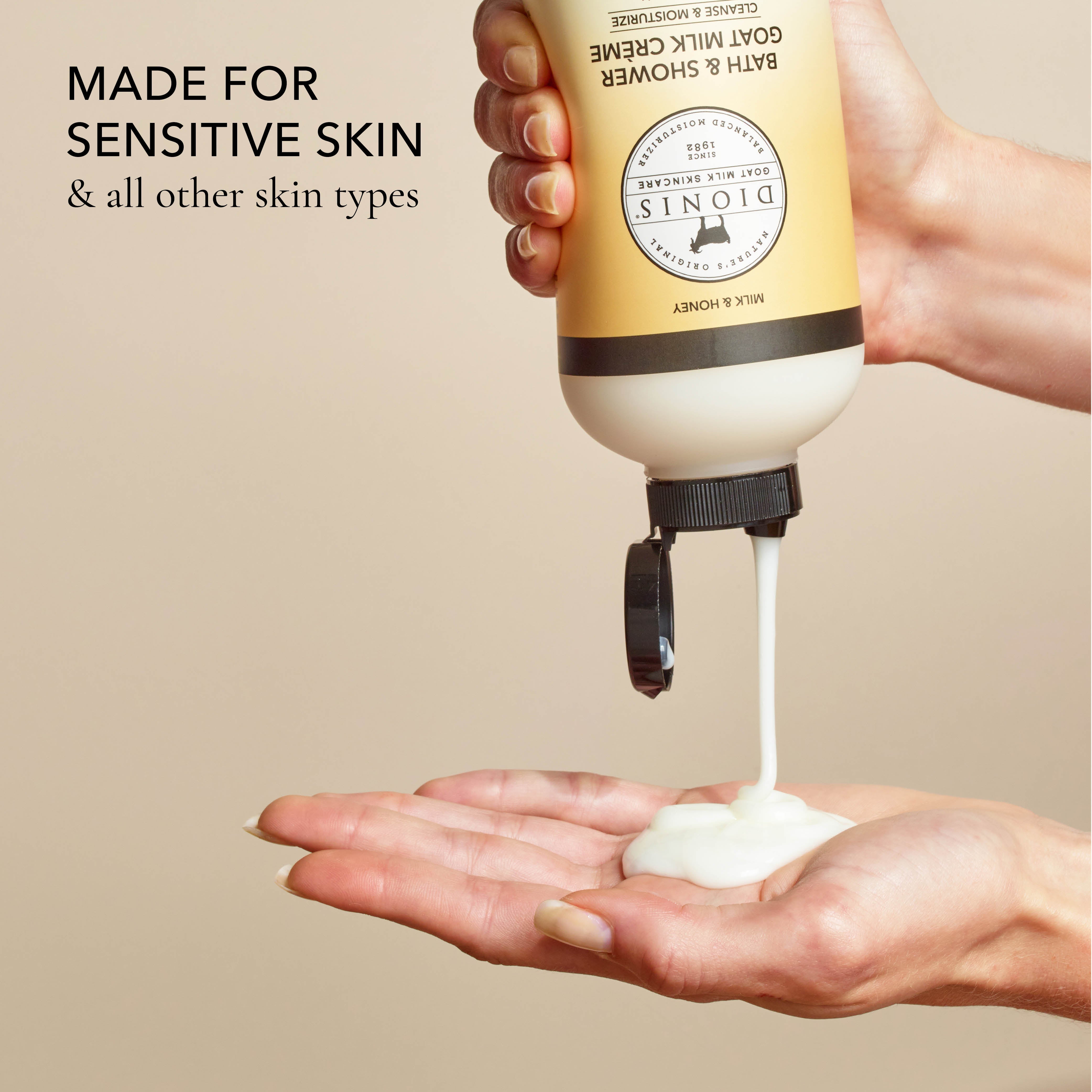 Hand holding a bottle of the shower creme and squeezing it out into the other hand, with the text that says "made for sensitive skin & all other skin types", all on a beige background.