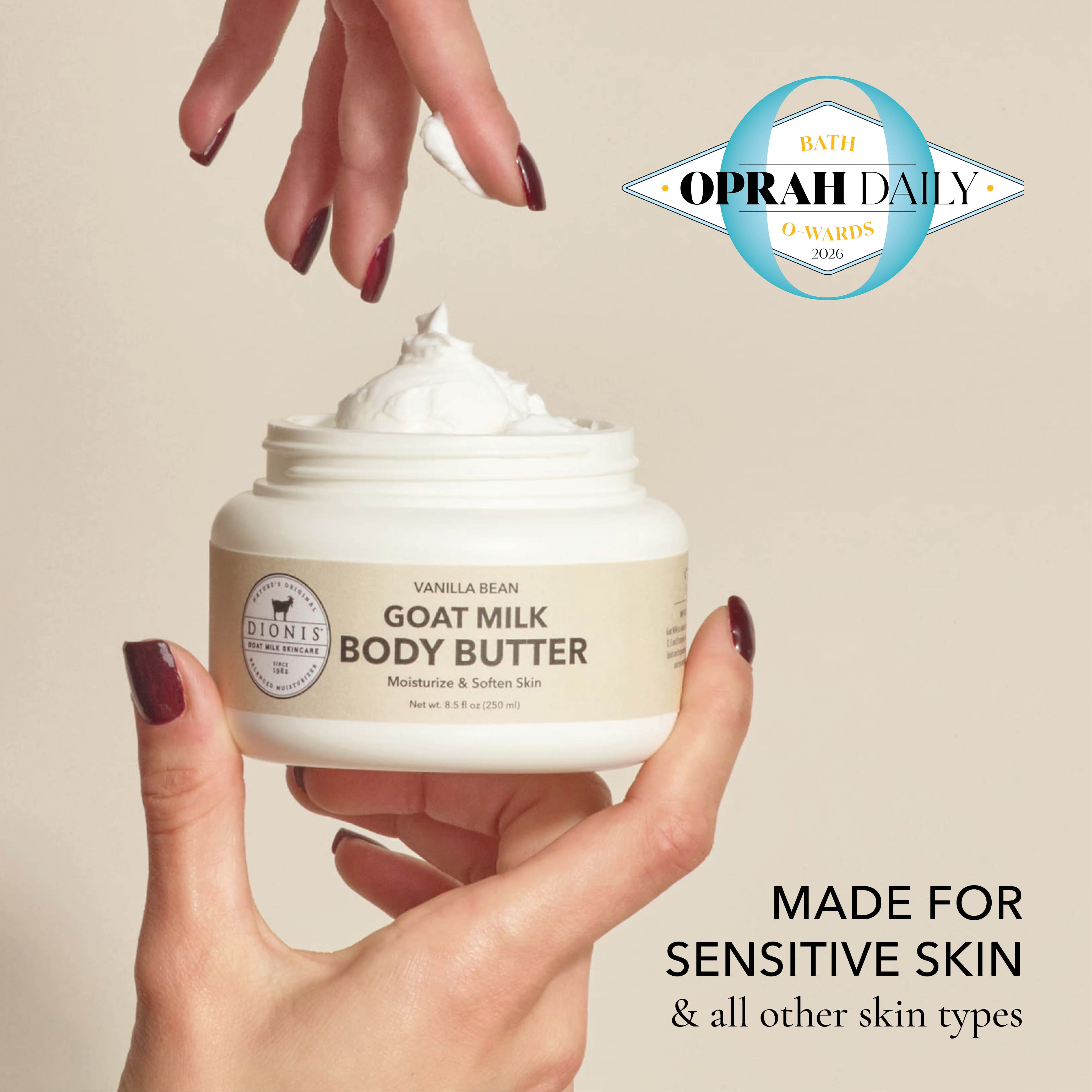 A woman's hand holds an open bottle of Dionis Goat Milk Body Butter in Vanilla Bean scent