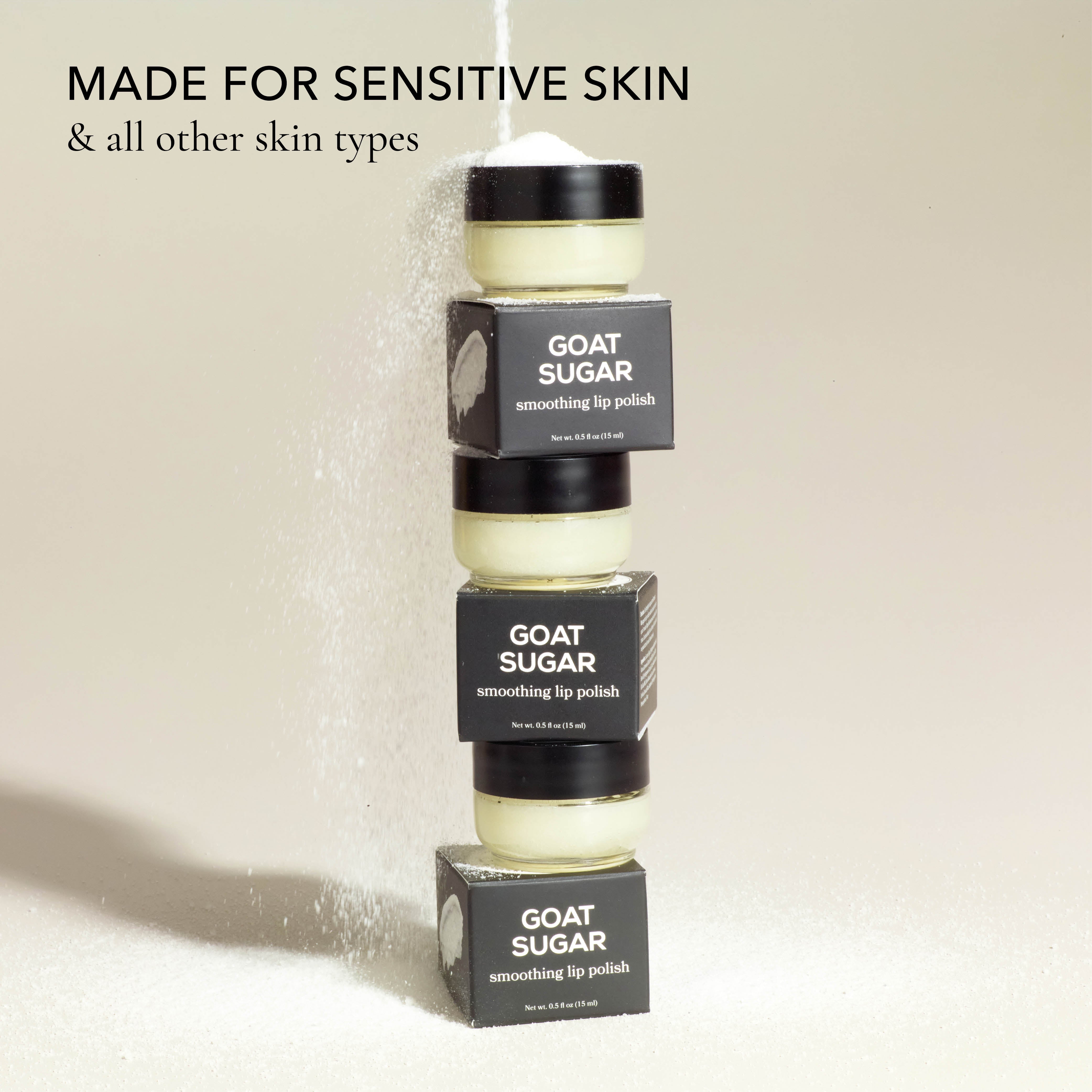 Dionis Goat Sugar Lip Polish stacked on top of each other with sugar pouring over them