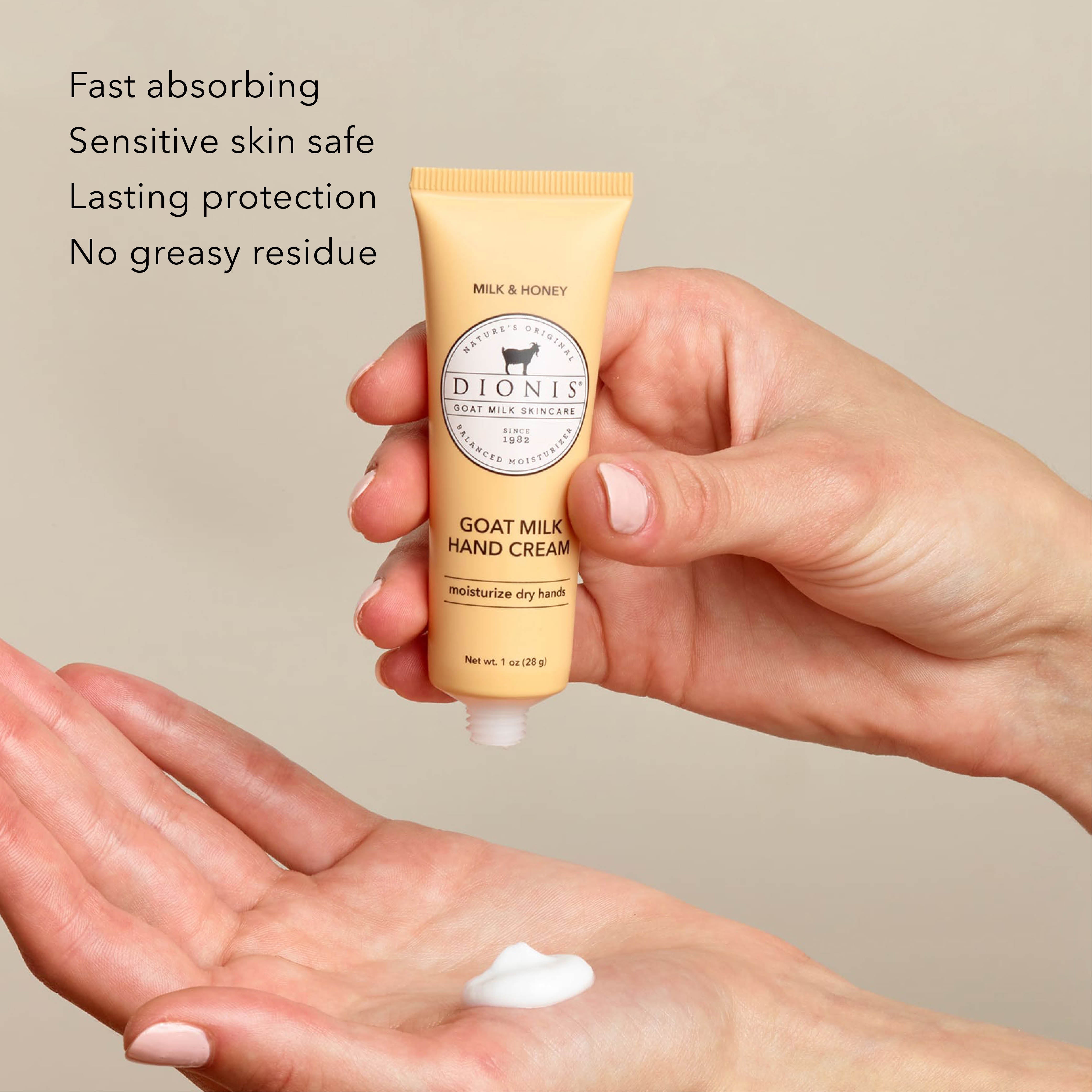 A hand holds a squeeze tube of Dionis Goat Milk Hand Cream in Milk & Honey against a neutral beige background, with another hand below holding a small dollop of the white cream. Text on the left highlights key product benefits.