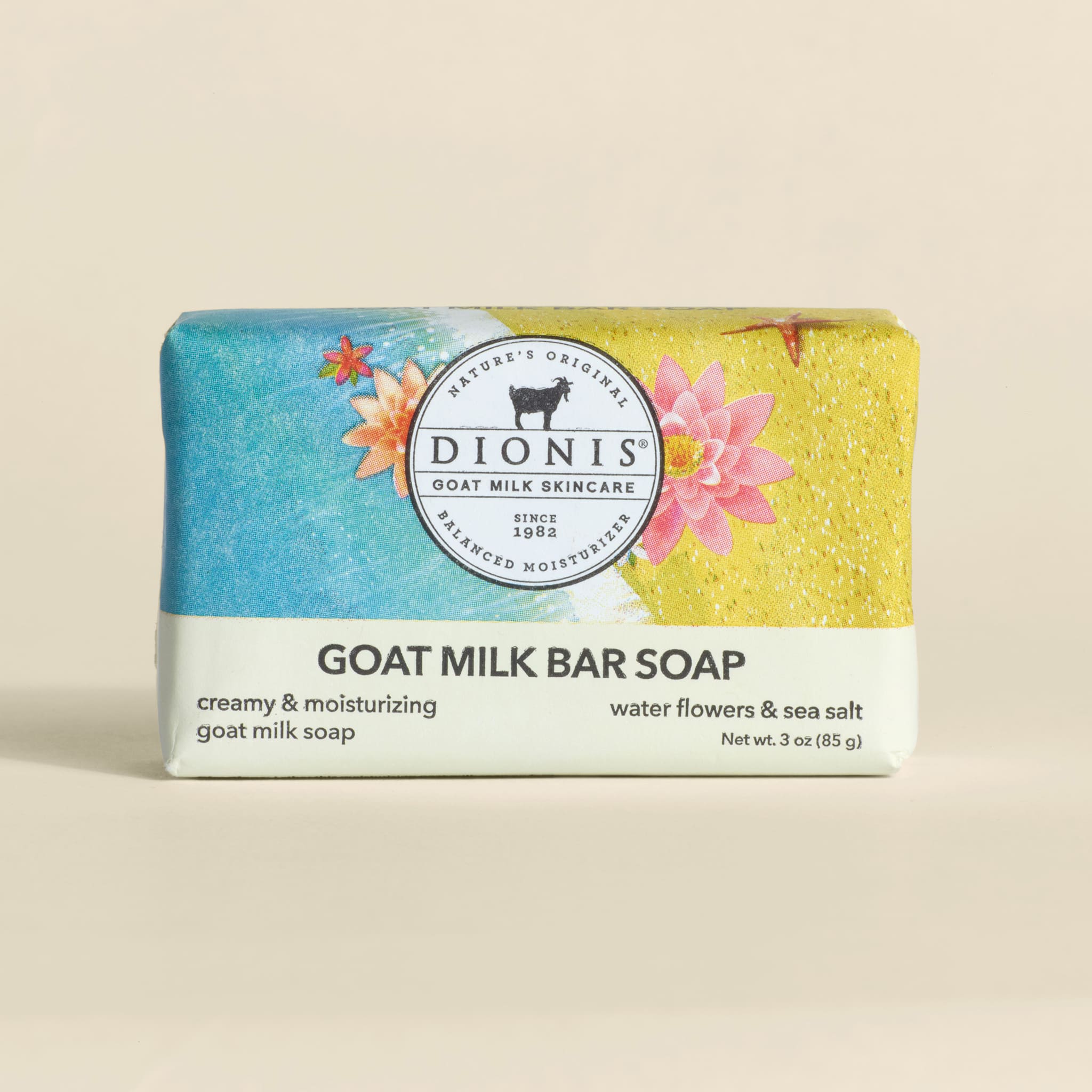 Dionis goat milk bar soap with floral design on a beige background