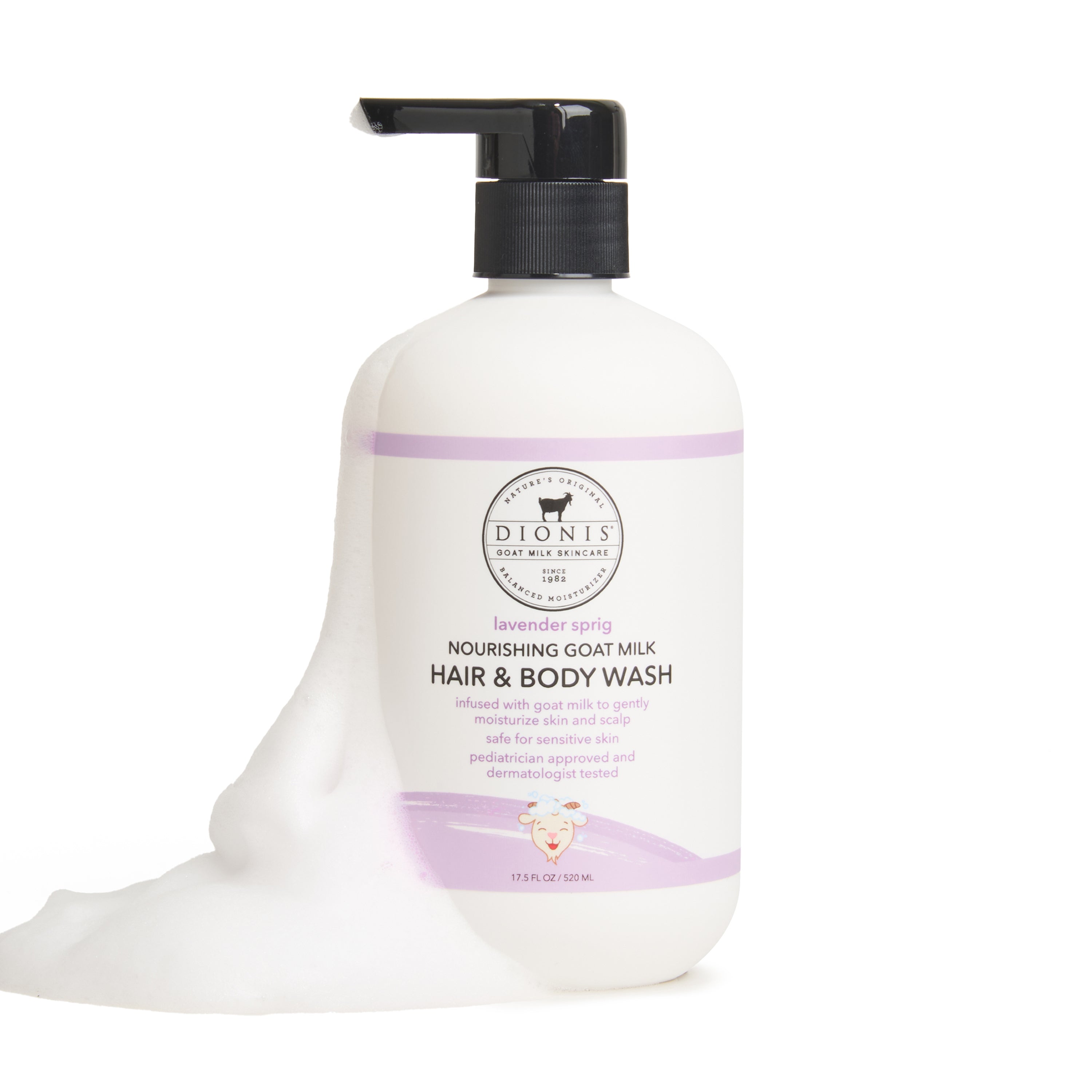 A bottle of Dionis Lavender Spring Nourishing Goat Milk Hair & Body Wash with a black pump dispenser, shown on a white background with a dollop of white lather in the foreground.