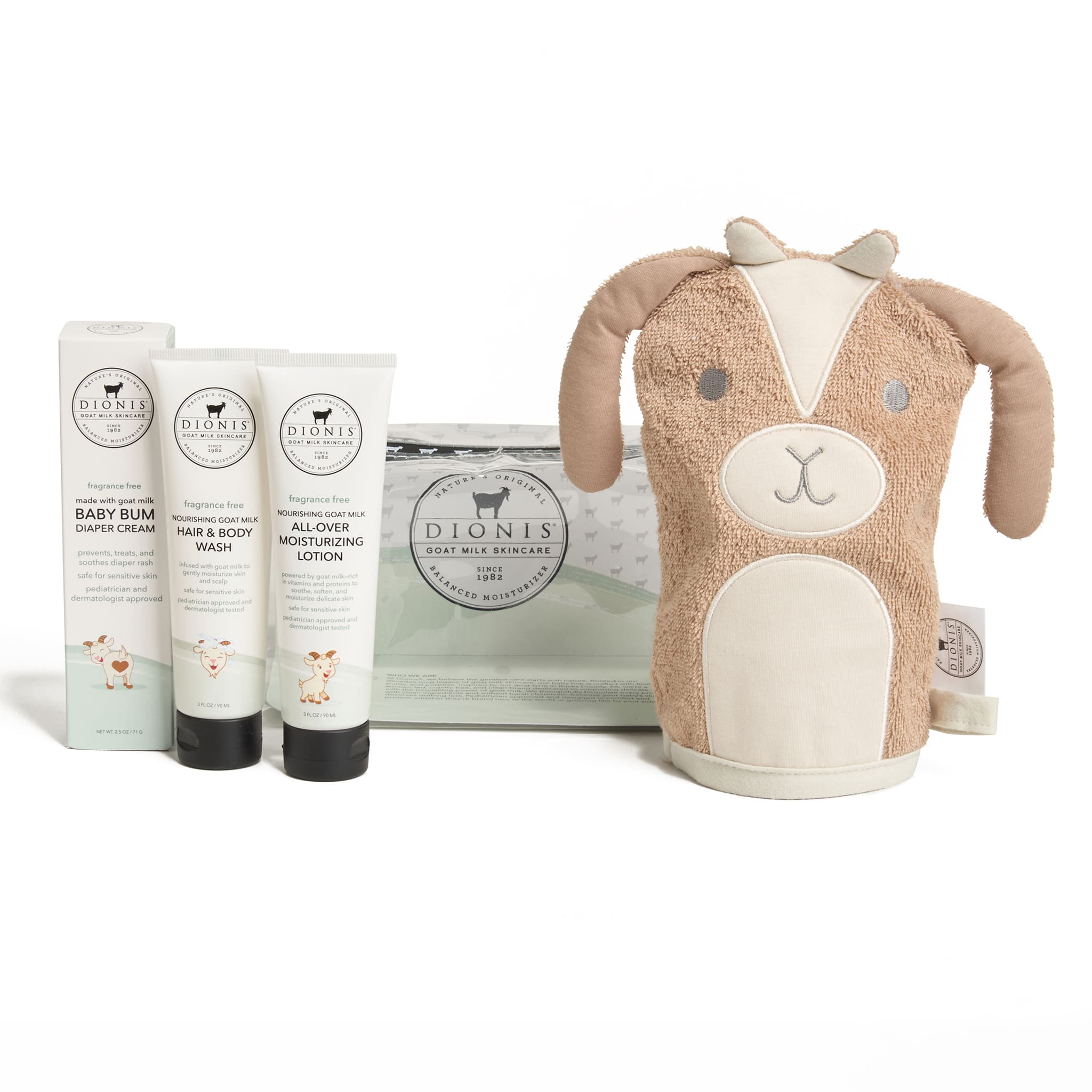 Dionis Baby Care gift set featuring a plush tan and cream goat-shaped bath mitt, a tube of baby bum shower cream, a tube of body wash, a tube of moisturizing lotion, and a gift bag on a white background.
