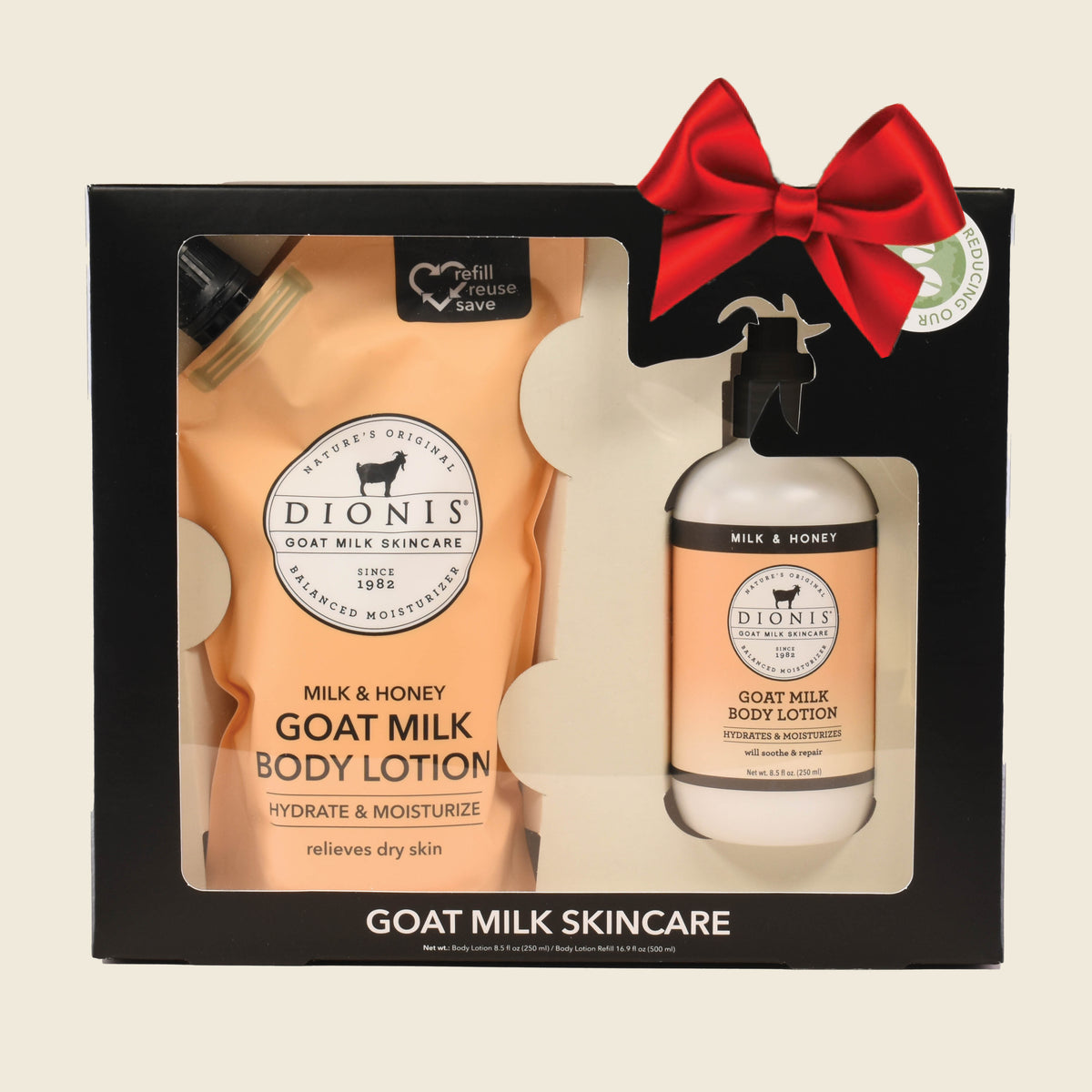 Dionis Goat Milk Body Lotion & Refill Pouch Gift Set, Black Gift Box
Milk & Honey Fragrance

Includes:
1 - Goat Milk Body Lotion, 8.5 oz
1 - Goat Milk Body Lotion Refill Pouch, 16.9 

Shown with a red bow