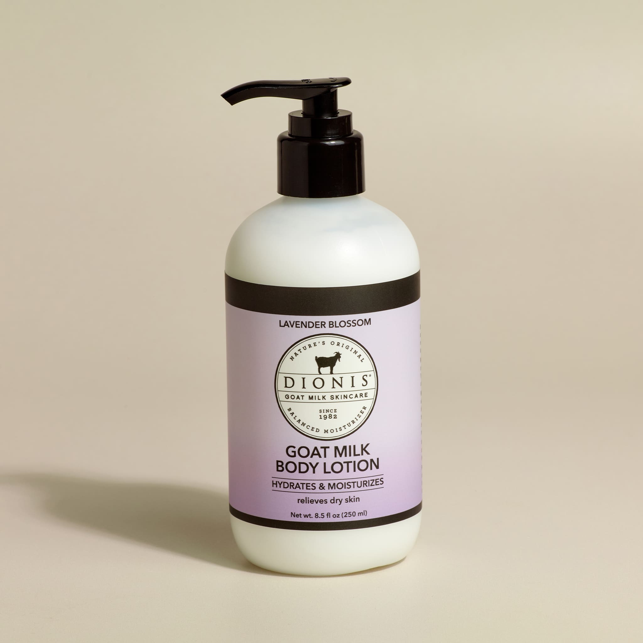 Dionis Goat Milk Body Lotion, Lavender Blossom, 8.5 fl oz with black pump.