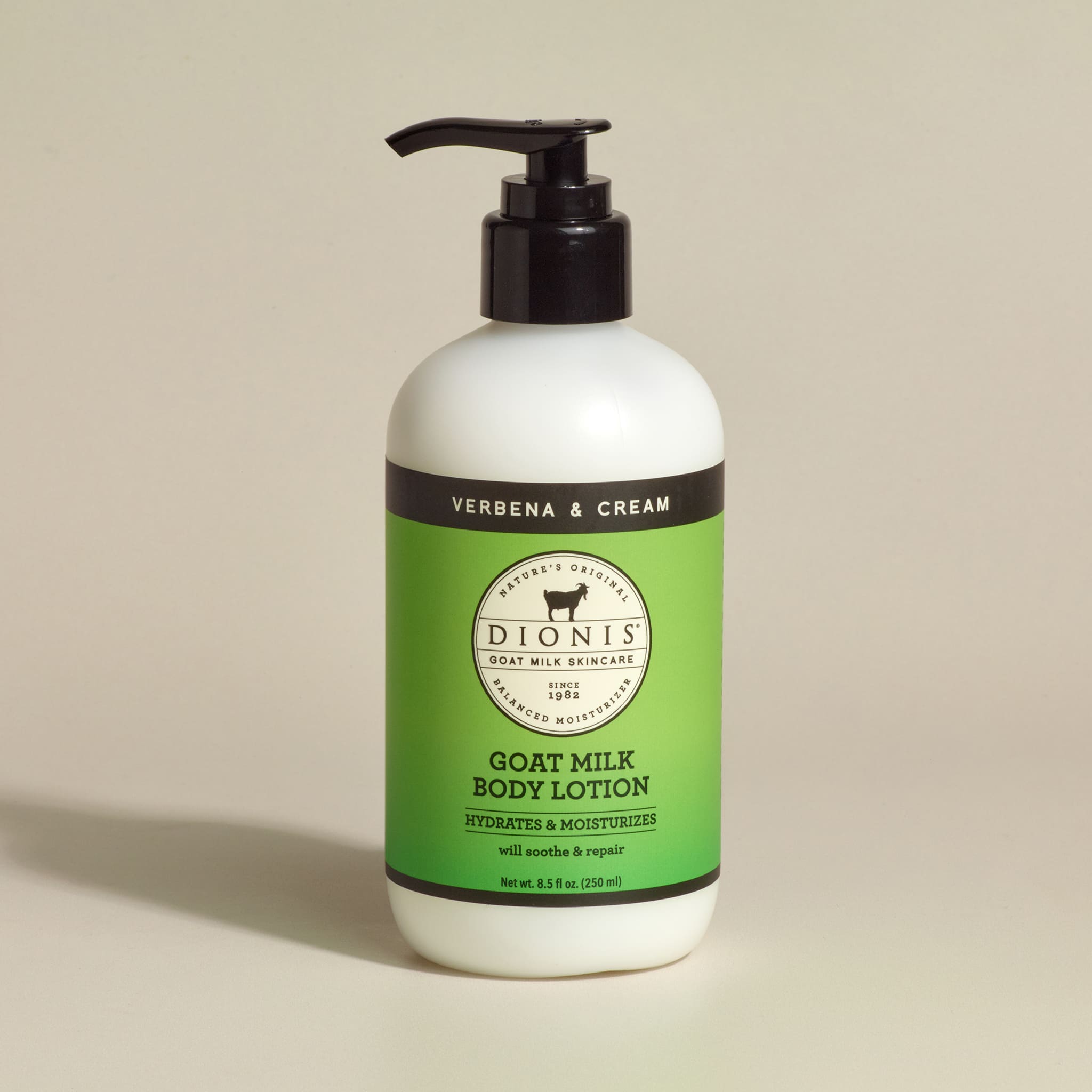 Dionis Goat Milk Body Lotion, Lemon Verbena & Cream, 8.5 fl oz with black pump.