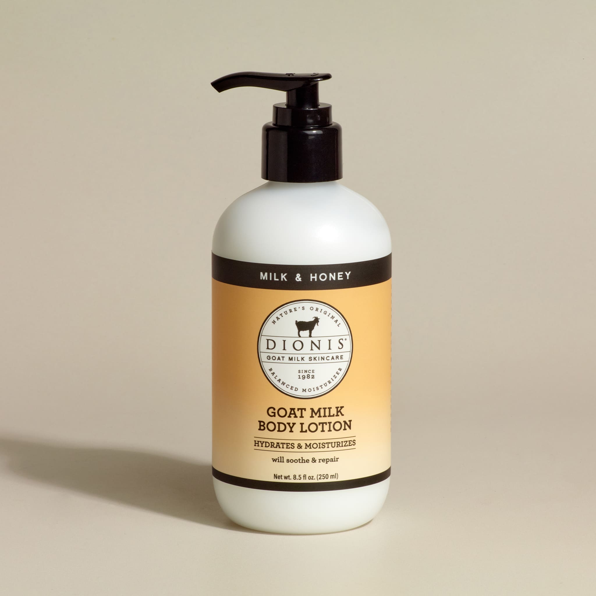 Dionis Body Lotion, Milk & Honey, 8.5 fl oz with black pump.