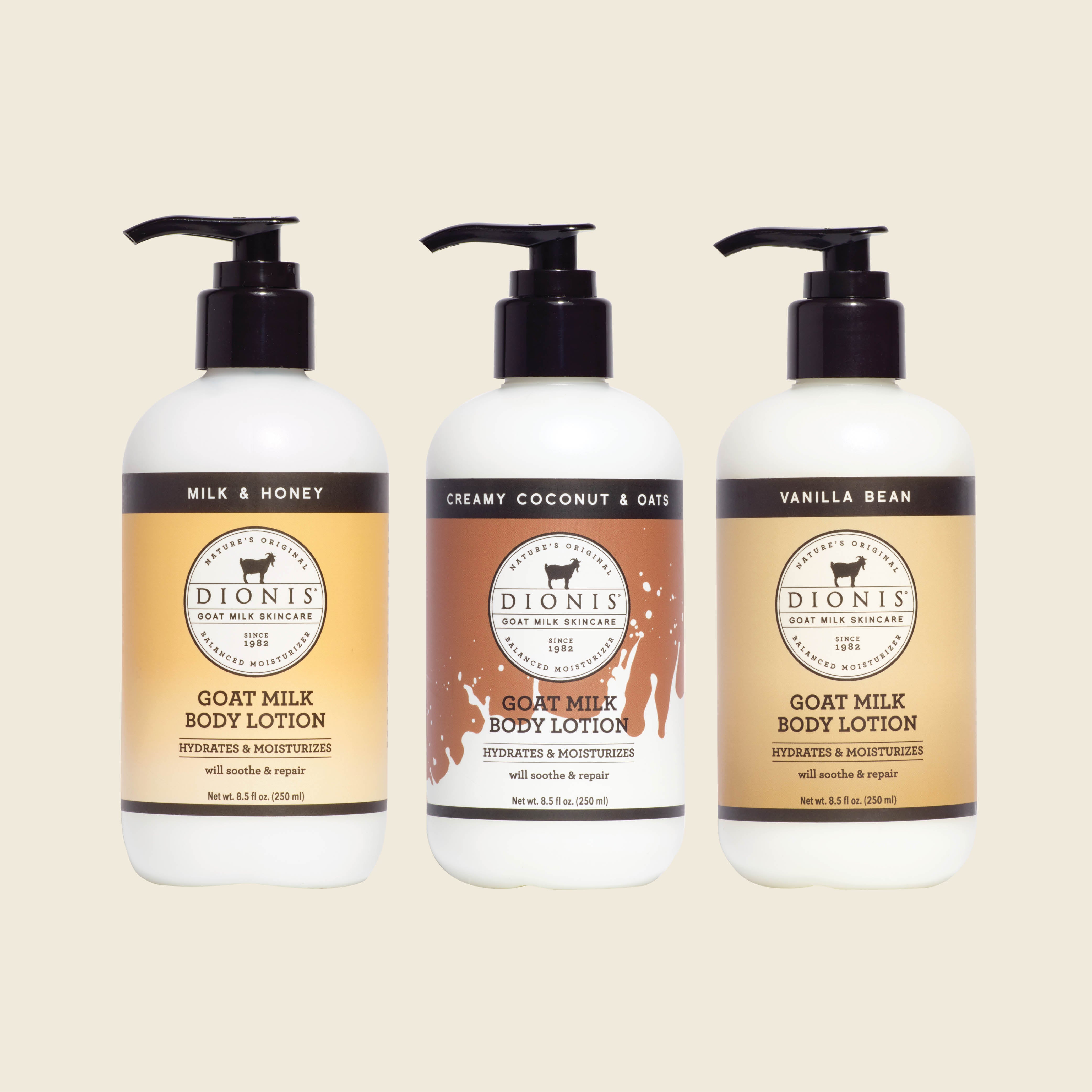 Three pump bottles of Dionis Goat Milk Body Lotion in Milk & Honey, Creamy Coconut & Oats, and Vanilla Bean scents, arranged side-by-side on a light beige background.