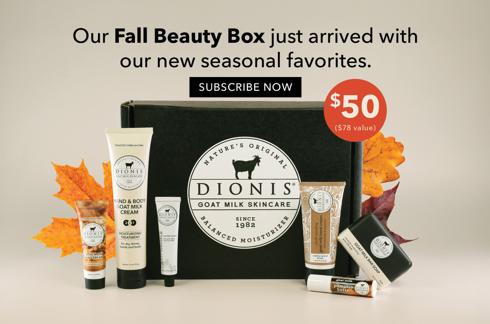 Dionis Goat Milk Skincare Fall Beauty Box set featuring a black gift box with Dionis logo, surrounded by skincare products in tubes and bottles, autumn leaves, and promotional text on a light beige background. The text reads: Our fall beauty box just arrived with our new seasonal favorites. Subscribe now." An orange call out circle shows the price is $50 compared to a value of $78.