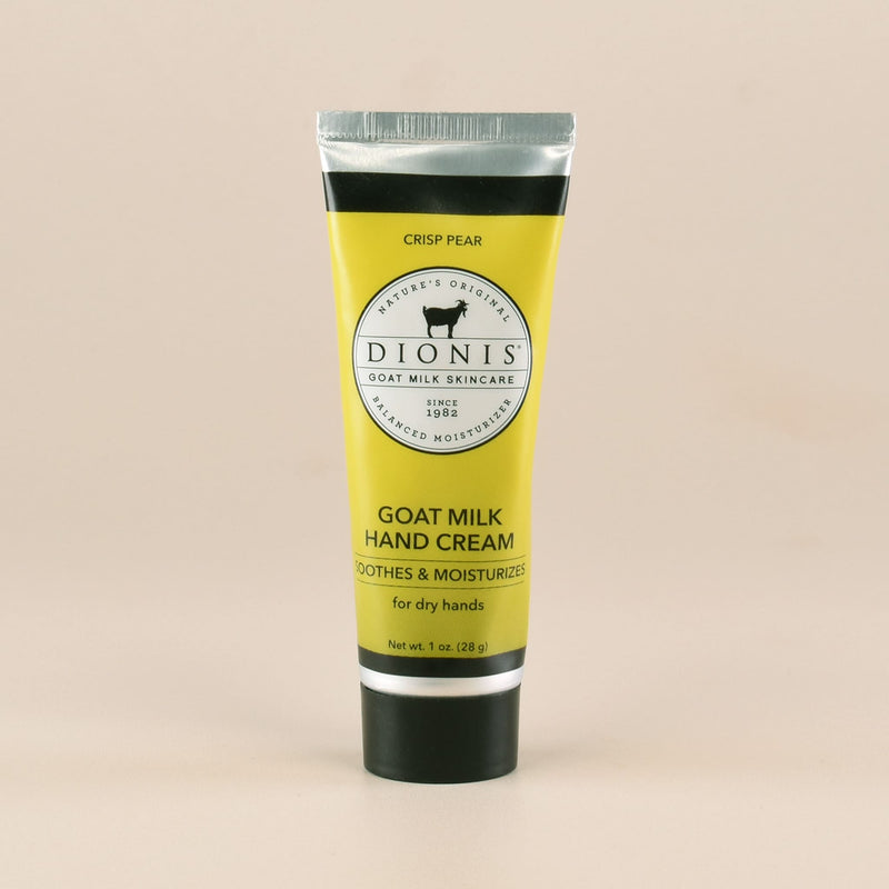 Tube of Dionis Goat Milk Crisp Pear Hand Cream on a beige background