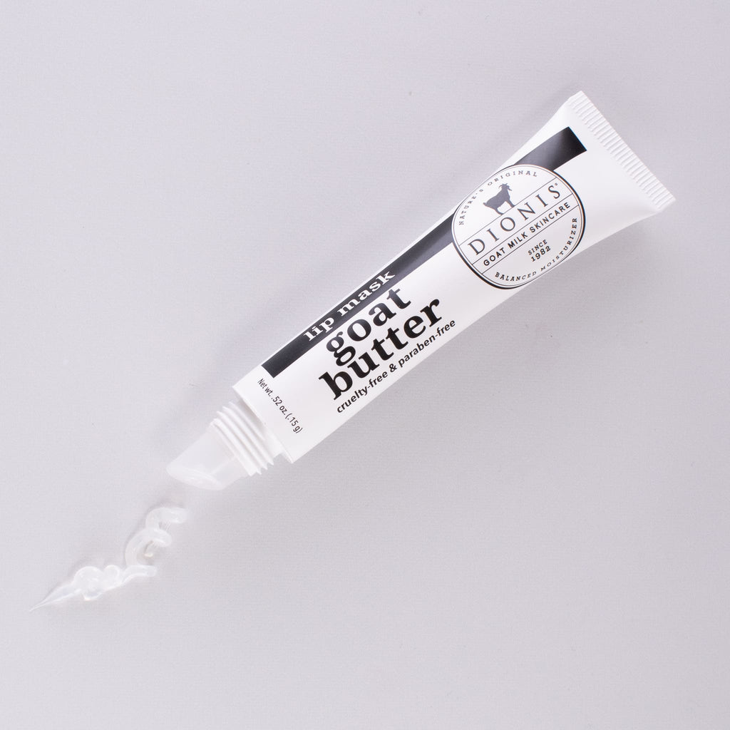 Tube of goat milk lip mask lip butter, with product coming out of tube