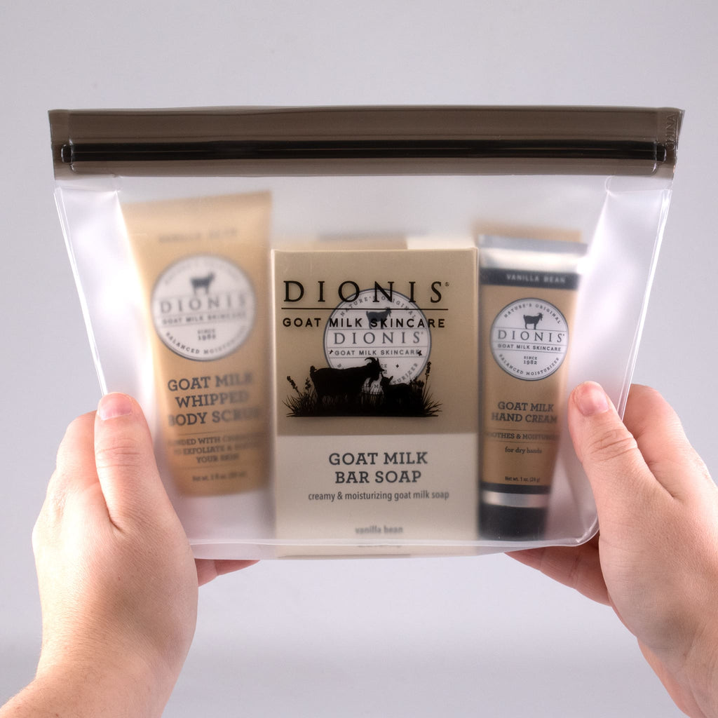 Hands holding Dionis Vanilla Bean Travel kit, with 5 products in a clear bag